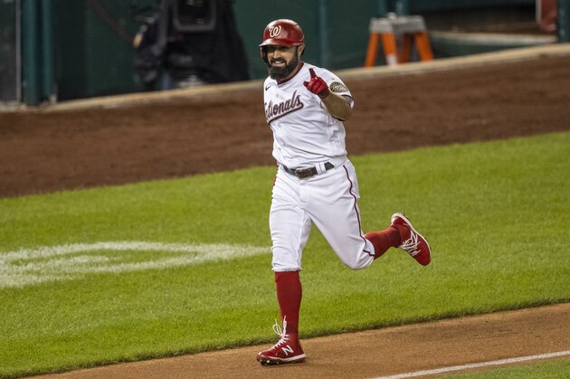 Washington Nationals' Adam Eaton gestures to his dugout as he rounds the bases after hitting a home run during the sixth inning of a baseball game against the Philadelphia Phillies in Washington, Tuesday, Aug. 25, 2020. (AP Photo/Manuel Balce Ceneta) Washington Nationals' Adam Eaton gestures to his dugout as he rounds the bases after hitting a home run during the sixth inning of a baseball game against the Philadelphia Phillies in Washington, Tuesday, Aug. 25, 2020. (AP Photo/Manuel Balce Ceneta)
