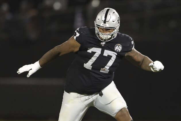 FILE - In this Sept. 9, 2019, file photo, Oakland Raiders offensive tackle Trent Brown (77) protects a gap in the offensive line during an NFL football game against the Denver Broncos, in Oakland, Calif. Raiders tackle Trent Brown has been sued by his ex-girlfriend and mother of his son for multiple acts of domestic violence over the past year. Diorra Marzette-Sanders filed a civil suit in Alameda County Superior Court on Tuesday, Oct. 15, 2019, detailing several attacks that left her bloodied, bruised and fearing for her safety. (AP Photo/Peter Joneleit, File)