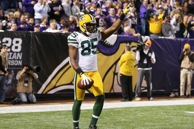 Green Bay Packers wide receiver Greg Jennings reacts after catching a 5-yard touchdown pass during the second half of an NFL football game against the Minnesota Vikings Sunday, Dec. 30, 2012, in Minneapolis. (AP Photo/Jim Mone) Green Bay Packers wide receiver Greg Jennings reacts after catching a 5-yard touchdown pass during the second half of an NFL football game against the Minnesota Vikings Sunday, Dec. 30, 2012, in Minneapolis. (AP Photo/Jim Mone)