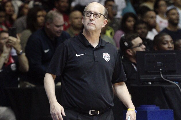FILE - In this Sept. 17, 2018, file photo, U.S. basketball coach Jeff Van Gundy stands on the sidelines during a FIBA Basketball World Cup 2019 qualifier against Panama in Panama City. The challenge that Van Gundy accepted 16 months ago was daunting: Take G League players, and turn them into a team good enough to earn USA Basketball a spot in next year's FIBA World Cup.  (AP Photo/Arnulfo Franco, File)