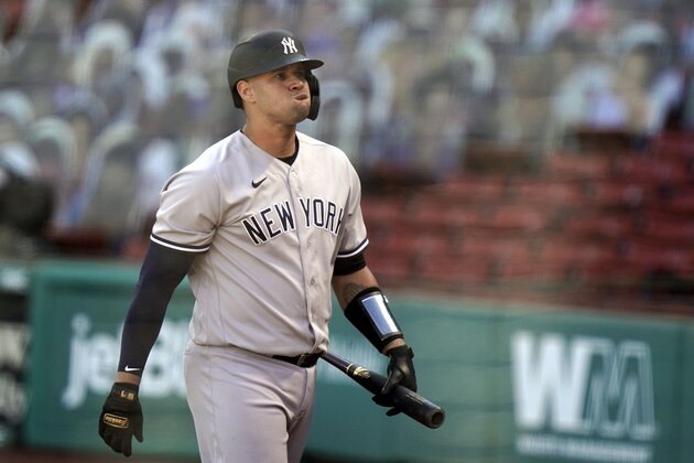 New York Yankees' Gary Sanchez reacts after he struck out swinging in the fifth inning of a baseball game against the Boston Red Sox, Sunday, Sept. 20, 2020, in Boston.  (AP Photo/Steven Senne)