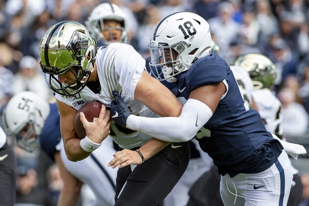 Purdue quarterback Jack Plummer (13) is sacked by Penn State defensive end Shaka Toney (18) an NCAA college football game in State College, Pa., on Saturday, Oct. 5, 2019. (AP Photo/Barry Reeger)
