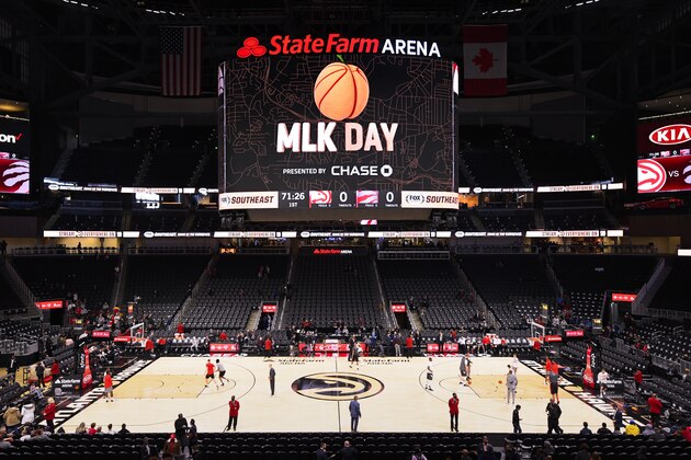 Players with the Atlanta Hawks and Toronto Raptors warm up before an annual MLK day afternoon NBA basketball game, Monday, Jan. 20, 2020, in Atlanta. (AP Photo/John Amis)