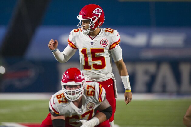 Kansas City Chiefs quarterback Patrick Mahomes (15) signals to teammates from under center against the Buffalo Bills during the second half of an NFL football game, Monday, Oct. 19, 2020, in Orchard Park, N.Y. (AP Photo/Brett Carlsen)