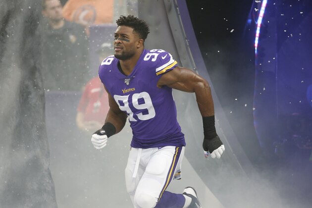 Minnesota Vikings defensive end Danielle Hunter runs onto the field before an NFL football game against the Philadelphia Eagles, Sunday, Oct. 13, 2019, in Minneapolis. (AP Photo/Bruce Kluckhohn)