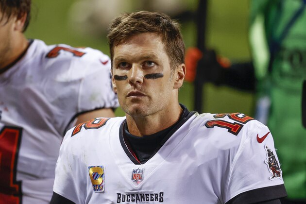 Tampa Bay Buccaneers quarterback Tom Brady (12) walks off the field after an NFL football game against the Chicago Bears, Thursday, Oct. 8, 2020, in Chicago. (AP Photo/Kamil Krzaczynski)
