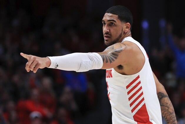Dayton's Obi Toppin (1) reacts to teammates in the first half of an NCAA college basketball game against Duquesne, Saturday, Feb. 22, 2020, in Dayton, Ohio. (AP Photo/Aaron Doster)