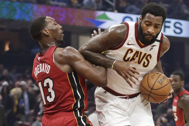 Cleveland Cavaliers' Andre Drummond, right, drives past Miami Heat's Bam Adebayo in the first half of an NBA basketball game, Monday, Feb. 24, 2020, in Cleveland. (AP Photo/Tony Dejak) Cleveland Cavaliers' Andre Drummond, right, drives past Miami Heat's Bam Adebayo in the first half of an NBA basketball game, Monday, Feb. 24, 2020, in Cleveland. (AP Photo/Tony Dejak)