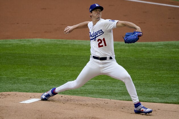 Los Angeles Dodgers starting pitcher Walker Buehler throws against the Atlanta Braves during the first inning in Game 6 of a baseball National League Championship Series Saturday, Oct. 17, 2020, in Arlington, Texas. (AP Photo/Tony Gutierrez)