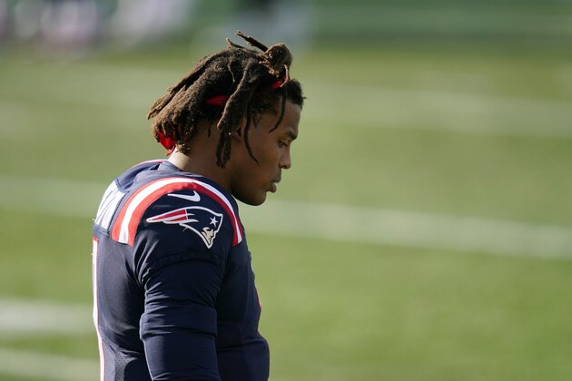 New England Patriots quarterback Cam Newton walks along the sideline in the second half of an NFL football game against the Denver Broncos, Sunday, Oct. 18, 2020, in Foxborough, Mass. (AP Photo/Charles Krupa)