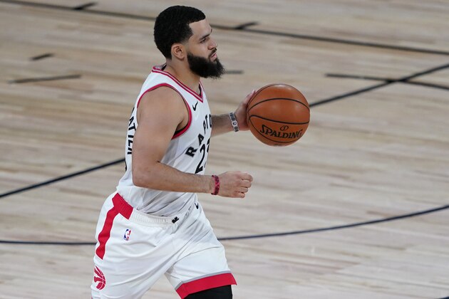 Toronto Raptors' Fred VanVleet (23) dribbles up the court against the Los Angeles Lakers during the second half of an NBA basketball game Saturday, Aug. 1, 2020, in Lake Buena Vista, Fla. (AP Photo/Ashley Landis, Pool)