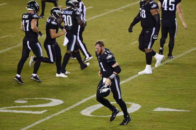 Philadelphia Eagles' Carson Wentz runs off the field during the second half of an NFL football game against the New York Giants, Thursday, Oct. 22, 2020, in Philadelphia. (AP Photo/Derik Hamilton)