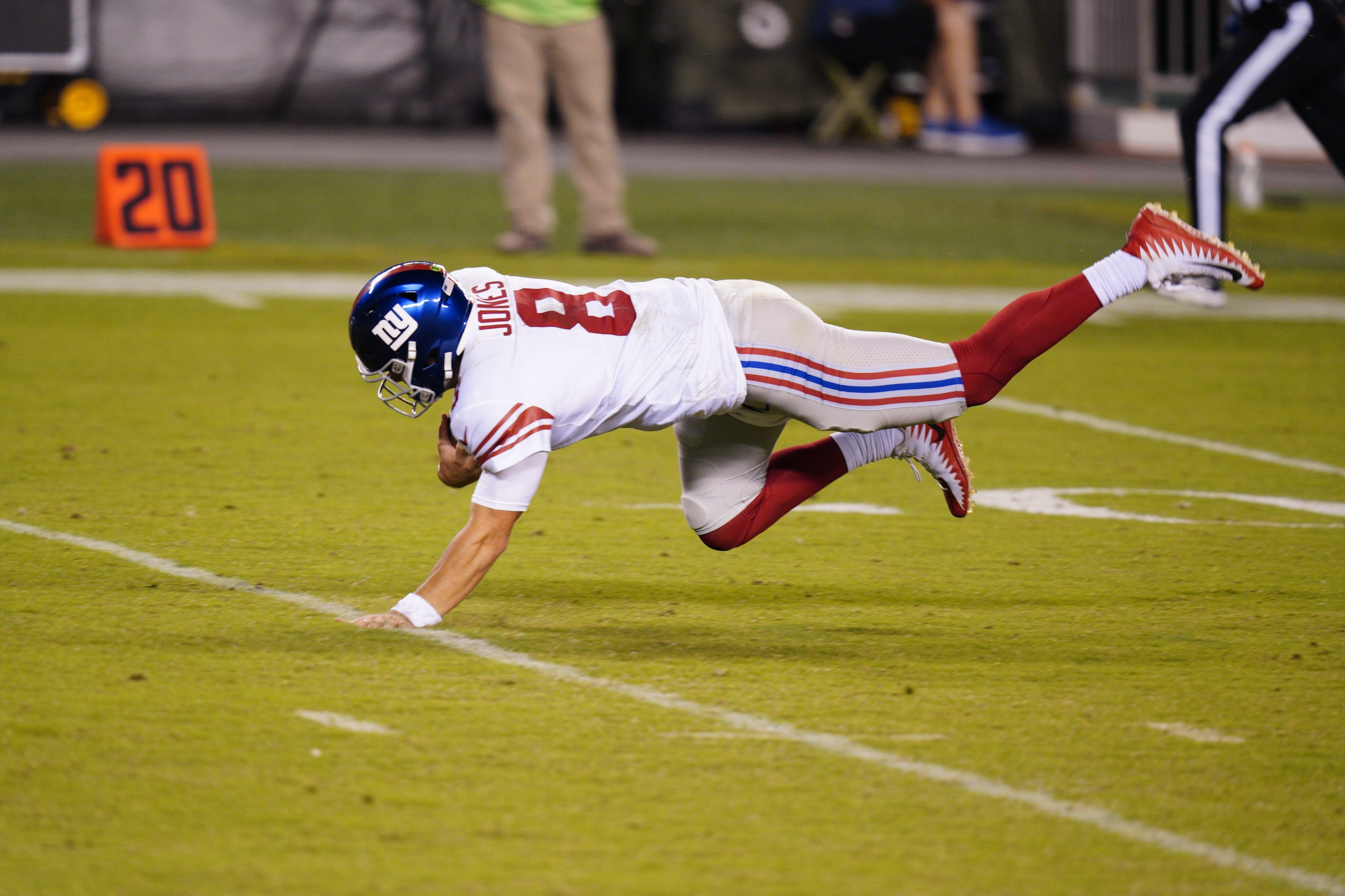 New York Giants' Daniel Jones trips after running with the ball during the second half of an NFL football game against the Philadelphia Eagles, Thursday, Oct. 22, 2020, in Philadelphia. (AP Photo/Chris Szagola)