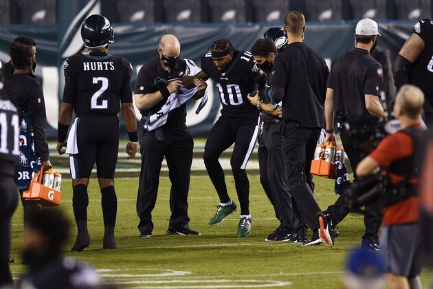 Philadelphia Eagles' DeSean Jackson is helped off the field after an injury during the second half of an NFL football game against the New York Giants, Thursday, Oct. 22, 2020, in Philadelphia. (AP Photo/Derik Hamilton)