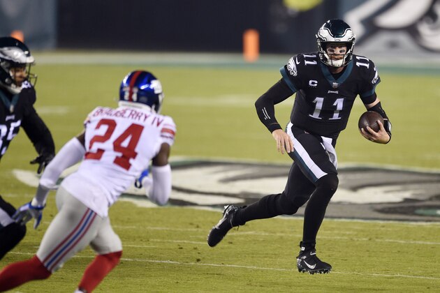 Philadelphia Eagles' Carson Wentz scrambles during the first half of an NFL football game against the New York Giants, Thursday, Oct. 22, 2020, in Philadelphia. (AP Photo/Derik Hamilton) Philadelphia Eagles' Carson Wentz scrambles during the first half of an NFL football game against the New York Giants, Thursday, Oct. 22, 2020, in Philadelphia. (AP Photo/Derik Hamilton)