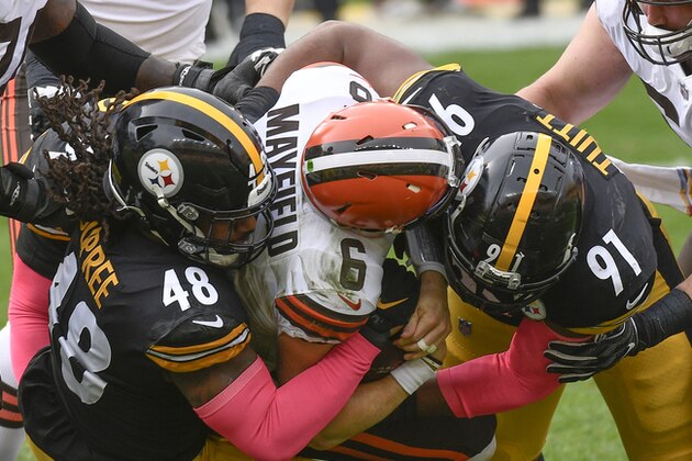 Cleveland Browns quarterback Baker Mayfield (6) is sacked by Pittsburgh Steelers defensive end Stephon Tuitt (91) and outside linebacker Bud Dupree (48) during the first half of an NFL football game, Sunday, Oct. 18, 2020, in Pittsburgh. (AP Photo/Don Wright) Cleveland Browns quarterback Baker Mayfield (6) is sacked by Pittsburgh Steelers defensive end Stephon Tuitt (91) and outside linebacker Bud Dupree (48) during the first half of an NFL football game, Sunday, Oct. 18, 2020, in Pittsburgh. (AP Photo/Don Wright)