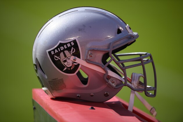 A Las Vegas Raiders helmet on the sidelines during an NFL football game against the Kansas City Chiefs, Sunday, Oct. 11, 2020, in Kansas City, Mo. (AP Photo/Reed Hoffmann)