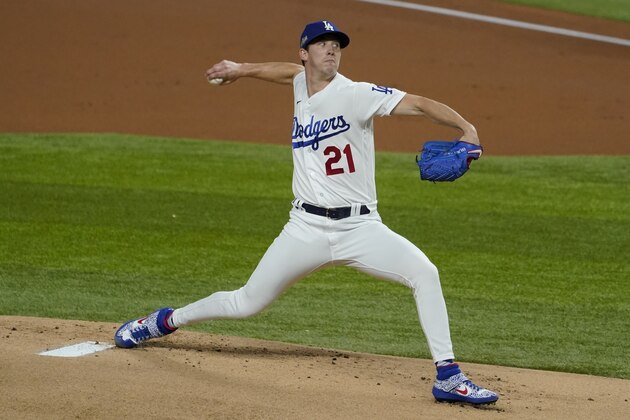 Los Angeles Dodgers starting pitcher Walker Buehler throws against the Atlanta Braves during the first inning in Game 1 of a baseball National League Championship Series Monday, Oct. 12, 2020, in Arlington, Texas. (AP Photo/Tony Gutierrez)