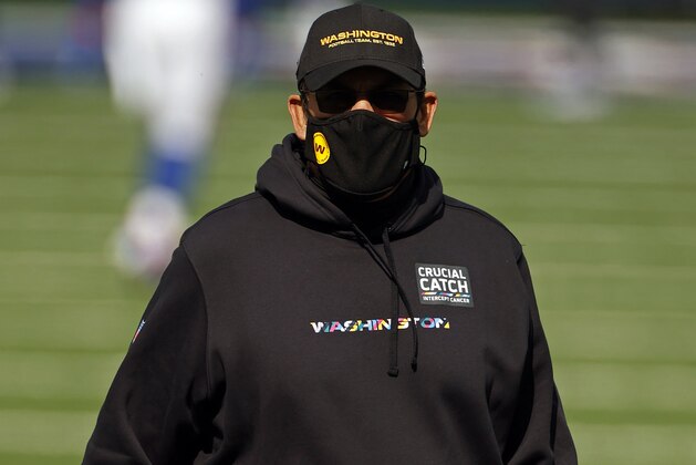 Washington Football Team head coach Ron Rivera walks off the field before an NFL football game against the New York Giants, Sunday, Oct. 18, 2020, in East Rutherford, N.J. (AP Photo/Adam Hunger)
