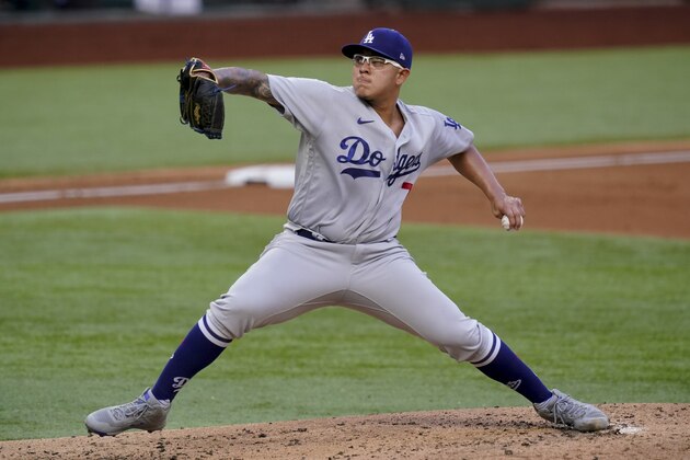 Los Angeles Dodgers starting pitcher Julio Urias throws against the Atlanta Braves during the first inning in Game 3 of a baseball National League Championship Series Wednesday, Oct. 14, 2020, in Arlington, Texas. (AP Photo/Eric Gay)