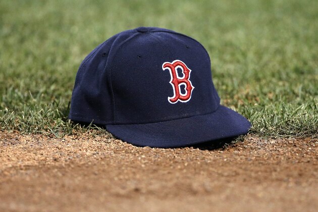 Boston Red Sox's Hanley Ramirez's hat lies on the field after he lost it while attempting to field a ball during the sixth inning of a baseball game against the Minnesota Twins in Boston, Saturday, July 23, 2016. (AP Photo/Michael Dwyer)