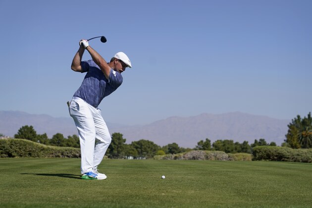 Bryson DeChambeau hits off the 10th tee during the final round of Shriners Hospitals for Children Open golf tournament Sunday, Oct. 11, 2020, in Las Vegas. (AP Photo/John Locher)