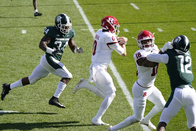 Rutgers quarterback Noah Vedral (0) runs down the sidelines for a 24-yard touchdown during the first half of an NCAA college football game against Michigan State, Saturday, Oct. 24, 2020, in East Lansing, Mich. (AP Photo/Carlos Osorio)