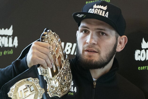 FILE - In this file photo dated Monday, Nov. 26, 2018, UFC lightweight champion Khabib Nurmagomedov holds the trophy belt during a news conference in Moscow, Russia. Khabib Nurmagomedov said Tuesday April 2, 2019, he doesn’t think Conor McGregor’s retirement is for real, adding, “I don’t think he’s finished.” (AP Photo/Pavel Golovkin, FILE) FILE - In this file photo dated Monday, Nov. 26, 2018, UFC lightweight champion Khabib Nurmagomedov holds the trophy belt during a news conference in Moscow, Russia. Khabib Nurmagomedov said Tuesday April 2, 2019, he doesn’t think Conor McGregor’s retirement is for real, adding, “I don’t think he’s finished.” (AP Photo/Pavel Golovkin, FILE)
