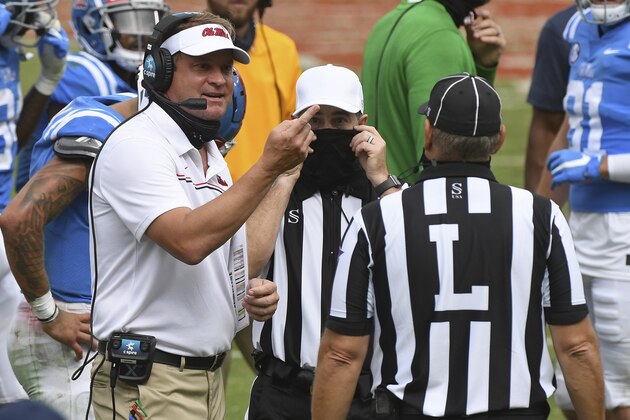 Mississippi head coach Lane Kiffin talks to officials during the second half of an NCAA college football game against Florida in Oxford, Miss., Saturday, Sept. 26, 2020. No. 5 Florida won 51-35. (AP Photo/Thomas Graning)