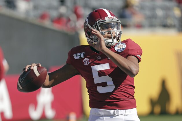 Alabama quarterback Taulia Tagovailoa (5) warms up before the Citrus Bowl NCAA college football game against Michigan, Wednesday, Jan. 1, 2020, in Orlando, Fla. (AP Photo/John Raoux) Alabama quarterback Taulia Tagovailoa (5) warms up before the Citrus Bowl NCAA college football game against Michigan, Wednesday, Jan. 1, 2020, in Orlando, Fla. (AP Photo/John Raoux)