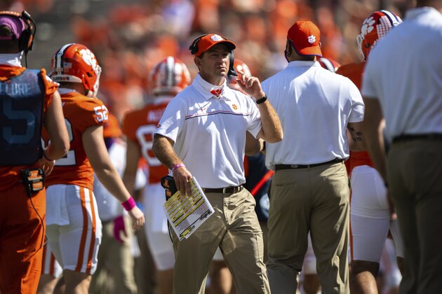 Clemson head coach Dabo Swinney walks near the sideline during an NCAA college football game against Syracuse in Syracuse, S.C., on Saturday, Oct. 24, 2020. (Ken Ruinard/Pool Photo via AP)
