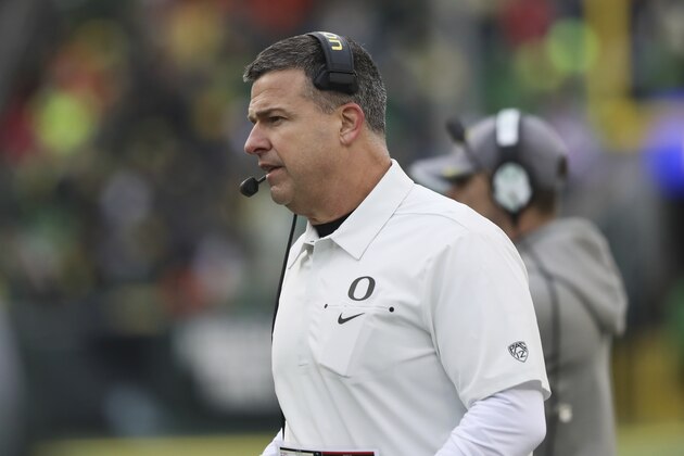 Oregon head coach Mario Cristobal watches the field during the second half of an NCAA college football game against Oregon State in Eugene, Ore., Saturday, Nov. 30, 2019. Oregon won 24-10. (AP Photo/Amanda Loman)
