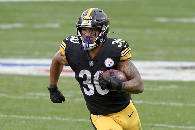 Pittsburgh Steelers running back James Conner (30) runs the ball against the Cleveland Browns during the second half of an NFL football game, Sunday, Oct. 18, 2020, in Pittsburgh. (AP Photo/Don Wright)