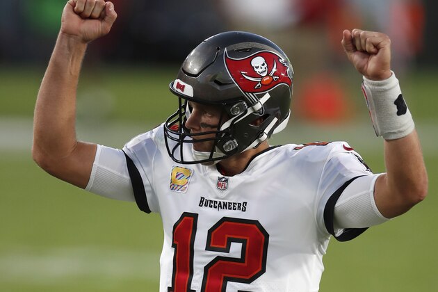 Tampa Bay Buccaneers quarterback Tom Brady (12) celebrates after a touchdown against the Green Bay Packers defense during an NFL football game Sunday, Oct. 18, 2020, in Tampa, Fla. (Jeff Haynes/AP Images for Panini)