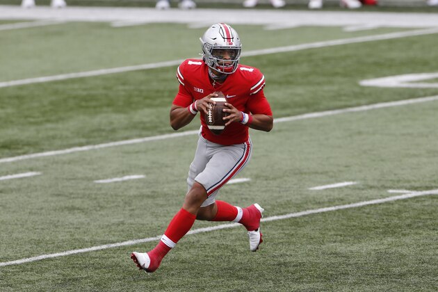 Ohio State quarterback Justin Fields plays against Nebraska during an NCAA college football game Saturday, Oct. 24, 2020, in Columbus, Ohio. (AP Photo/Jay LaPrete)