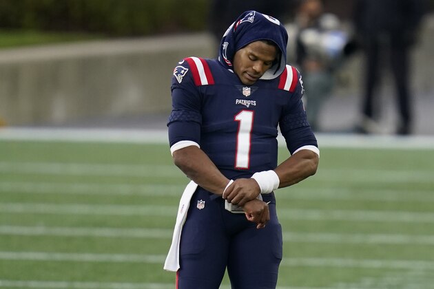 New England Patriots quarterback Cam Newton walks on the sideline in the first half of an NFL football game against the San Francisco 49ers, Sunday, Oct. 25, 2020, in Foxborough, Mass. (AP Photo/Charles Krupa)