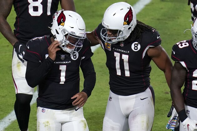 Arizona Cardinals quarterback Kyler Murray (1) celebrates his touchdown with wide receiver Larry Fitzgerald (11) during the second half of an NFL football game against the Seattle Seahawks, Sunday, Oct. 25, 2020, in Glendale, Ariz. (AP Photo/Ross D. Franklin)