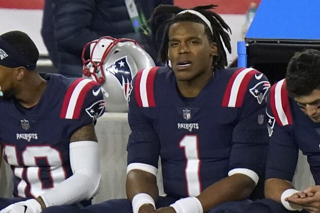 New England Patriots quarterbacks Cam Newton, left, and Jarrett Stidham sit on the bench with offensive coordinator Josh McDaniels, right, in the second half of an NFL football game against the San Francisco 49ers, Sunday, Oct. 25, 2020, in Foxborough, Mass. (AP Photo/Steven Senne)