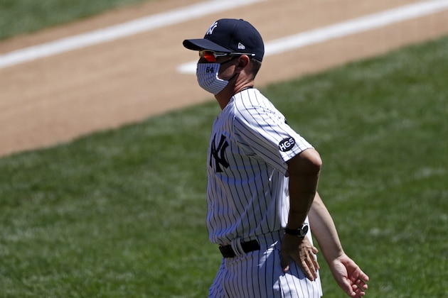 New York Yankees bench coach Carlos Mendoza prior to a baseball game against the Tampa Bay Rays on Thursday, Aug. 20, 2020, in New York. (AP Photo/Adam Hunger)