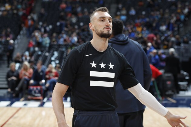 Washington Wizards forward Sam Dekker (8) in the first half of an NBA basketball game Sunday, March 31, 2019, in Denver. (AP Photo/David Zalubowski)