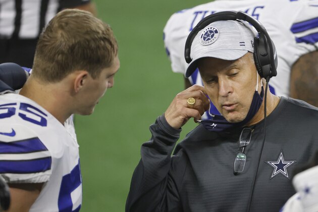 Dallas Cowboys linebacker Leighton Vander Esch (55) talks with defensive coordinator Mike Nolan, right, in the first half of an NFL football game against the Arizona Cardinals in Arlington, Texas, Monday, Oct. 19, 2020. (AP Photo/Ron Jenkins) Dallas Cowboys linebacker Leighton Vander Esch (55) talks with defensive coordinator Mike Nolan, right, in the first half of an NFL football game against the Arizona Cardinals in Arlington, Texas, Monday, Oct. 19, 2020. (AP Photo/Ron Jenkins)