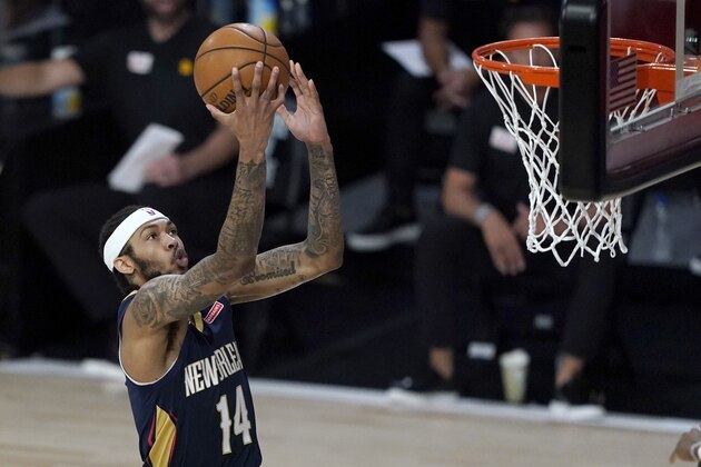 New Orleans Pelicans' Brandon Ingram heads to the basket during the first half of an NBA basketball game against the Utah Jazz Thursday, July 30, 2020, in Lake Buena Vista, Fla. (AP Photo/Ashley Landis, Pool)