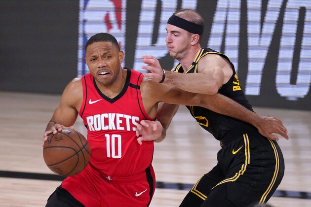 Houston Rockets' Eric Gordon (10) drives against Los Angeles Lakers' Alex Caruso during the first half of an NBA conference semifinal playoff basketball game Sunday, Sept. 6, 2020, in Lake Buena Vista, Fla. (AP Photo/Mark J. Terrill)
