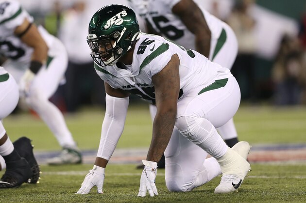 FILE - In this Sunday, Oct. 13, 2019, file photo, New York Jets defensive tackle Quinnen Williams (95) gets set at the line of scrimmage during the second half of an NFL football game against the Dallas Cowboys in East Rutherford, N.J. Brothers and NFL rookies Quinnen and Quincy Williams have more than 60 friends and family members coming to the first game of their lives on opposing teams when the Jets and Jaguars meet. (AP Photo/Steve Luciano, File)