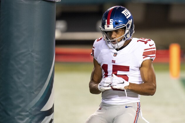 New York Giants wide receiver Golden Tate (15) reacts to his touchdown by hitting the goal post like a boxing bag during the NFL football game against the Philadelphia Eagles, Thursday, Oct. 22, 2020, in Philadelphia. (AP Photo/Chris Szagola)