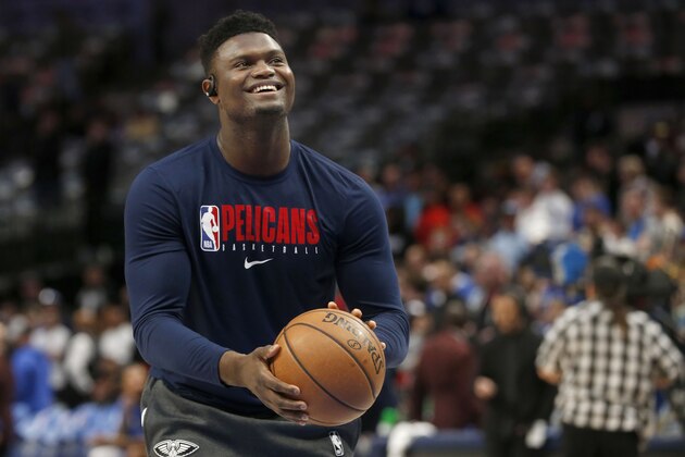 FILE - In this March 4, 2020, file photo, New Orleans Pelicans forward Zion Williamson shoots free throws prior to an NBA basketball game against the Dallas Mavericks in Dallas. The NBA said Saturday, July 25, 2020, that Williamson will have to serve a four-day quarantine for leaving the leagueâ€™s Disney bubble on July 16 to tend to an urgent family matter. (AP Photo/Michael Ainsworth, File)