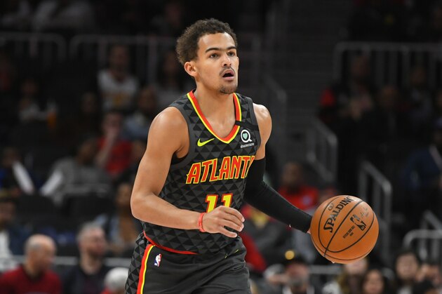 Atlanta Hawks guard Trae Young (11) works during an NBA basketball game against the Charlotte Hornets, Monday, March 9, 2020, in Atlanta. (AP Photo/John Amis)