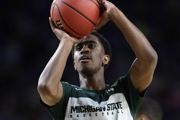 Michigan State's Brock Washington warms up during a practice session for the semifinals of the Final Four NCAA college basketball tournament, Friday, April 5, 2019, in Minneapolis. (AP Photo/David J. Phillip) Michigan State's Brock Washington warms up during a practice session for the semifinals of the Final Four NCAA college basketball tournament, Friday, April 5, 2019, in Minneapolis. (AP Photo/David J. Phillip)