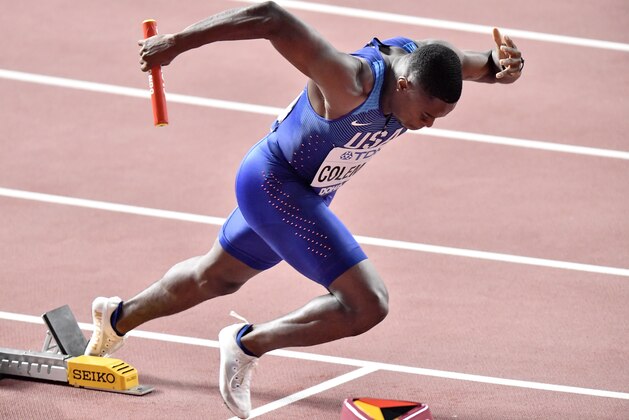 Christian Coleman of the United States starts at the men's 4x100 meter Relay at the World Athletics Championships in Doha, Qatar, Friday, Oct. 4, 2019. (AP Photo/Martin Meissner)