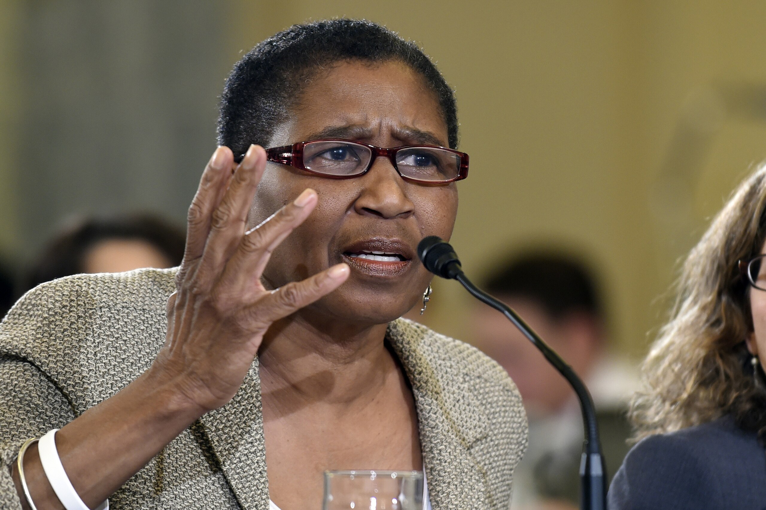 FILE - In this Dec. 2, 2014, file photo, Michele Roberts, executive director of the National Basketball Players Association, testifies on Capitol Hill in Washington. Roberts planned on being in the NBAâ€™s restart bubble at Walt Disney World for a few days. Three weeks, at the most. She never left. (AP Photo/Susan Walsh, File)